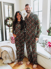 This cozy pajama set features an array of sleighs, Christmas trees, reindeer and more. Perfect for the holidays, this Mystic Forest print brings festive charm and timeless style. Made from a soft, brushed fabric, these holiday plaid pajamas are ideal for cozy mornings, matching family photos, or relaxing by the fire. This family matching Christmas pajama set offers both comfort and classic holiday style you’ll love all season long.